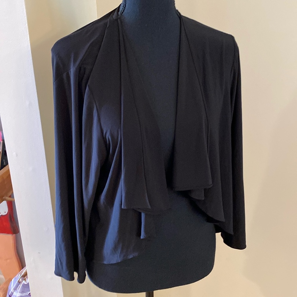 Black short jacket/cardigan. Size 12. Great over Little black dress.